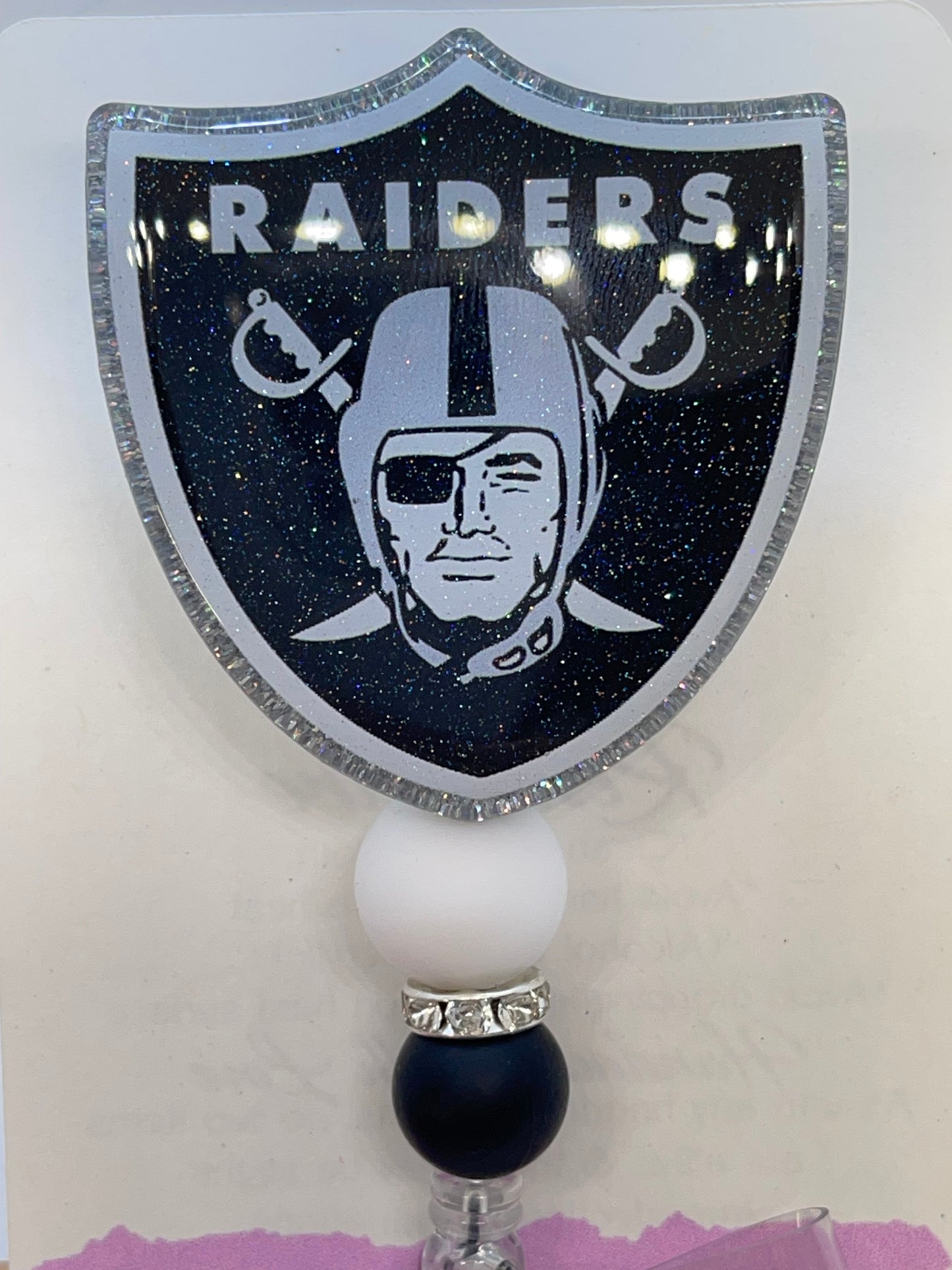 Raiders Shield Badge Reel w/ Beads