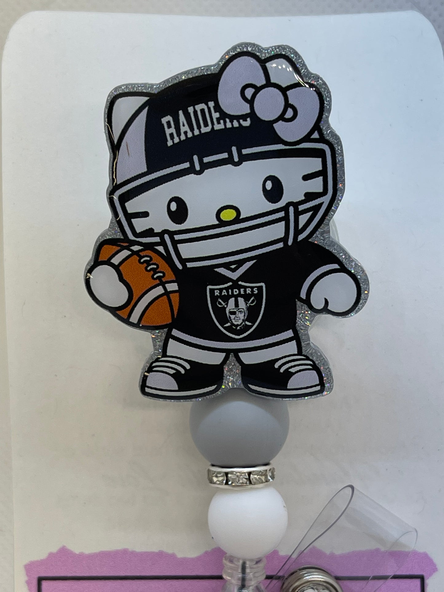 Raiders Kitty Badge Reel w/ Beads